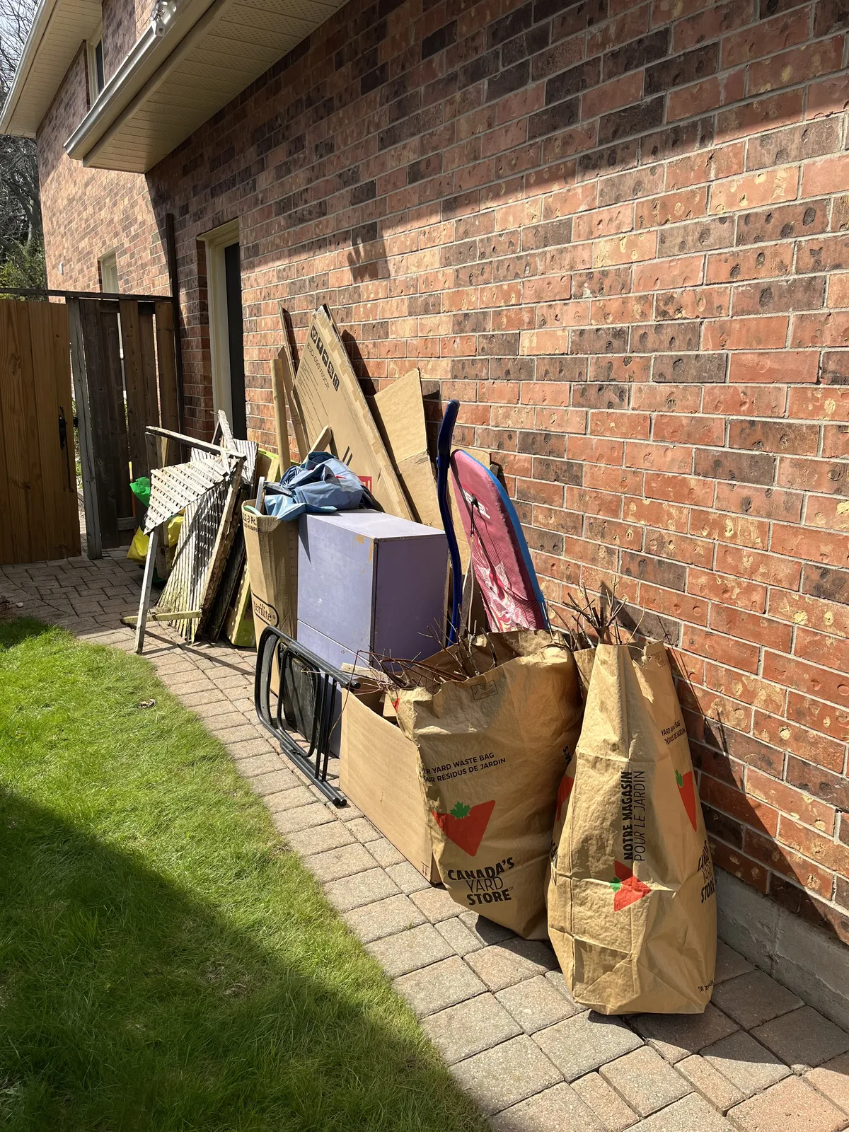 Large pile of mixed household junk before cleanup