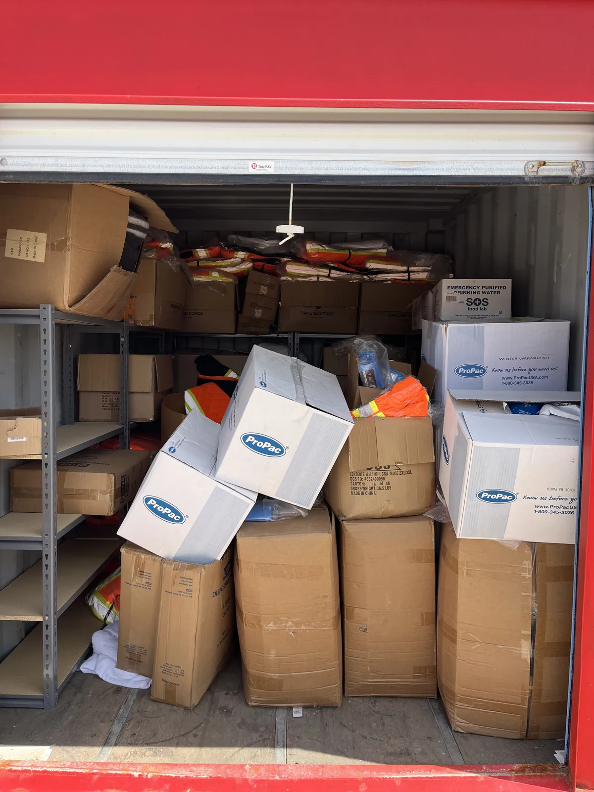 Full garage packed with stored items before a complete cleanout